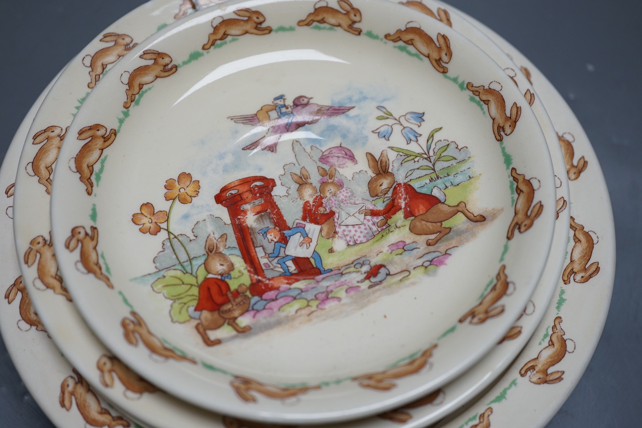 Royal Doulton Bunnykins: two dishes, 19 and 15cm, pair of side plates and a saucer